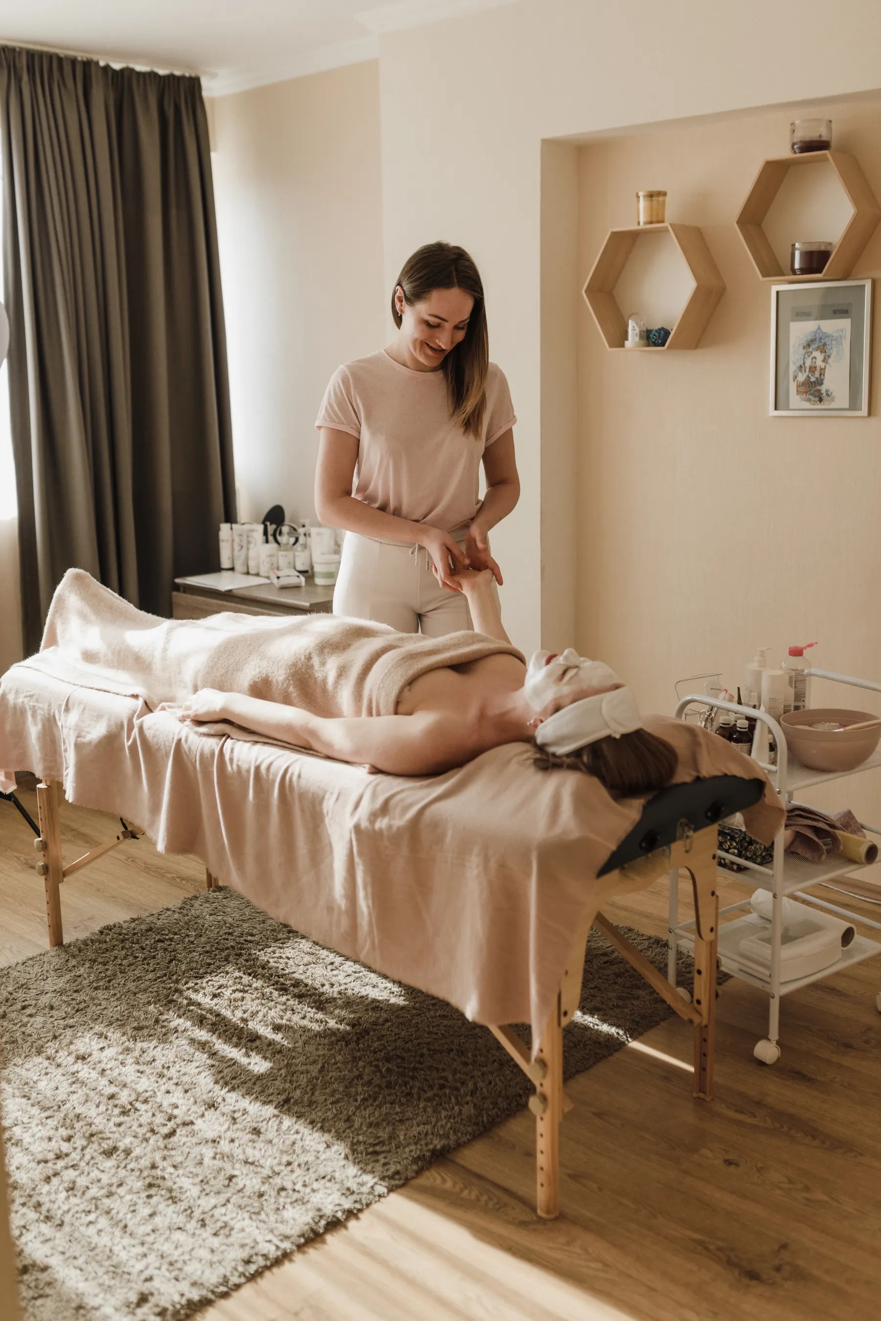 Massage appointment in a softly lit treatment room